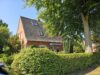 Gemütliches Wohnhaus mit Potenzial auf tollem Gartengrundstück - 12 - Straßenansicht