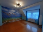 5 - Schlafzimmer - Gemütliche Dachgeschosswohnung mit Balkon und ausgebautem Studio